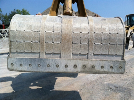 Armor clamshell buckets with Kenco Wear Patch