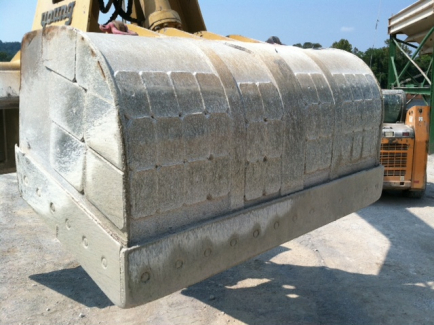 Armor clamshell buckets with Kenco Wear Patch