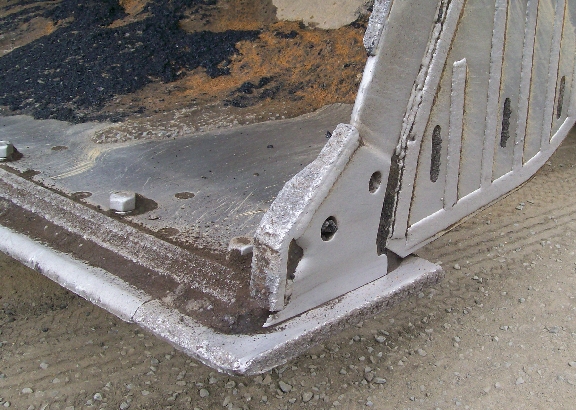 TCI wear strips shape cut to protect the corner