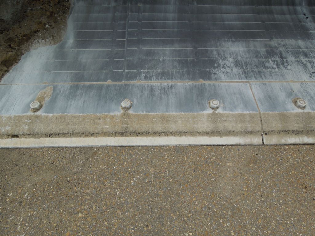Fabricated Kenco TCI moldboard cover after 1.5 years in high RAP plant